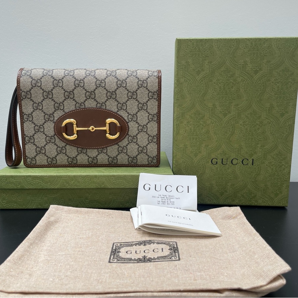 Gucci wristlet clutch